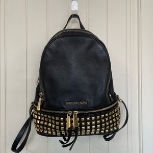 Michael Kors medium rhea black and gold backpack